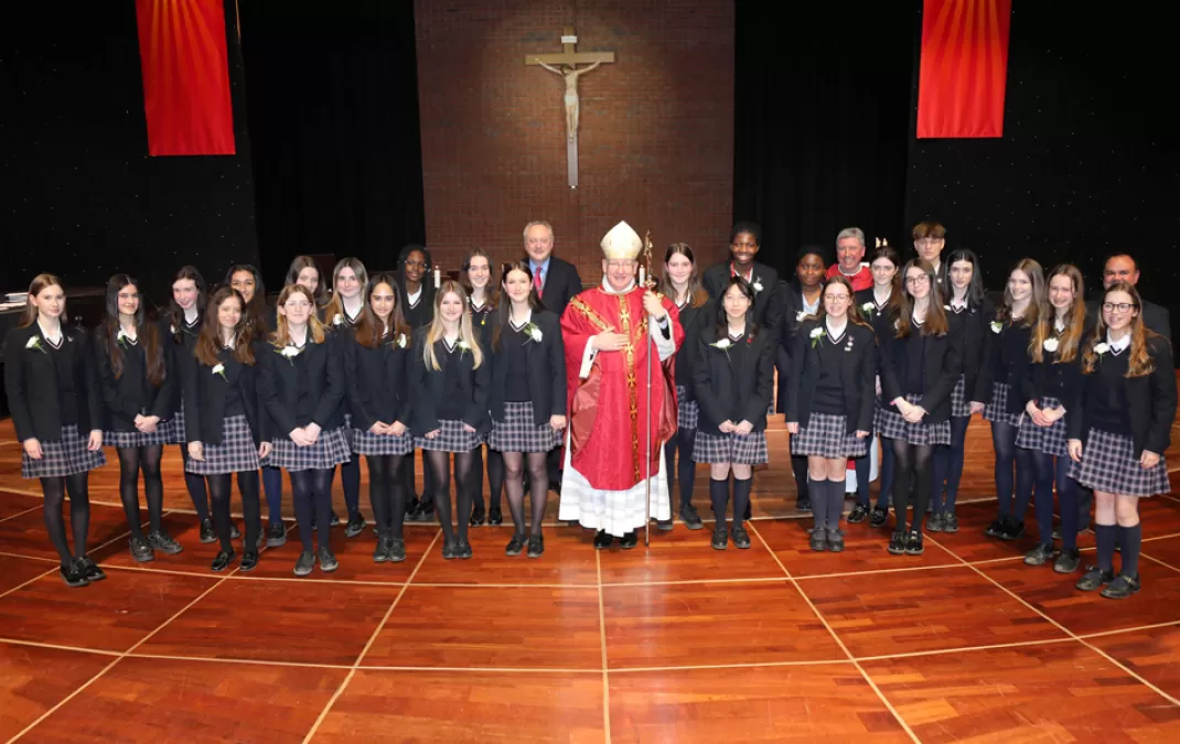 A happy and joyful occasion as Bishop Richard Moth confirms 25 Woldingham students