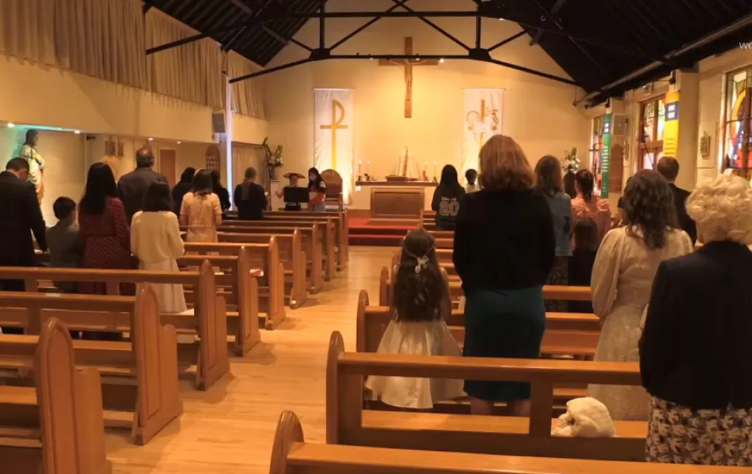 Students celebrate First Holy Communion at last Sunday’s Mass