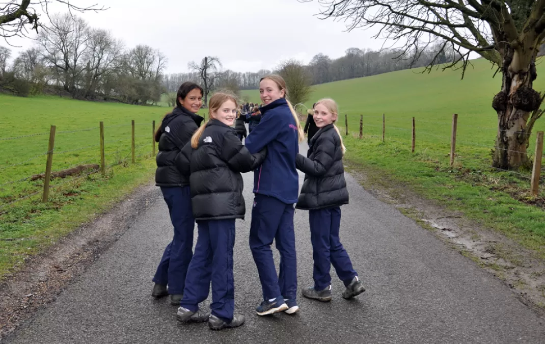 Rain doesn’t stop play as Woldingham walks for wellbeing and a good cause