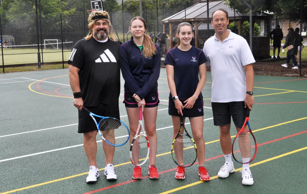 Rain doesn’t dampen spirits at this year’s Parent/Daughter Tennis Tournament