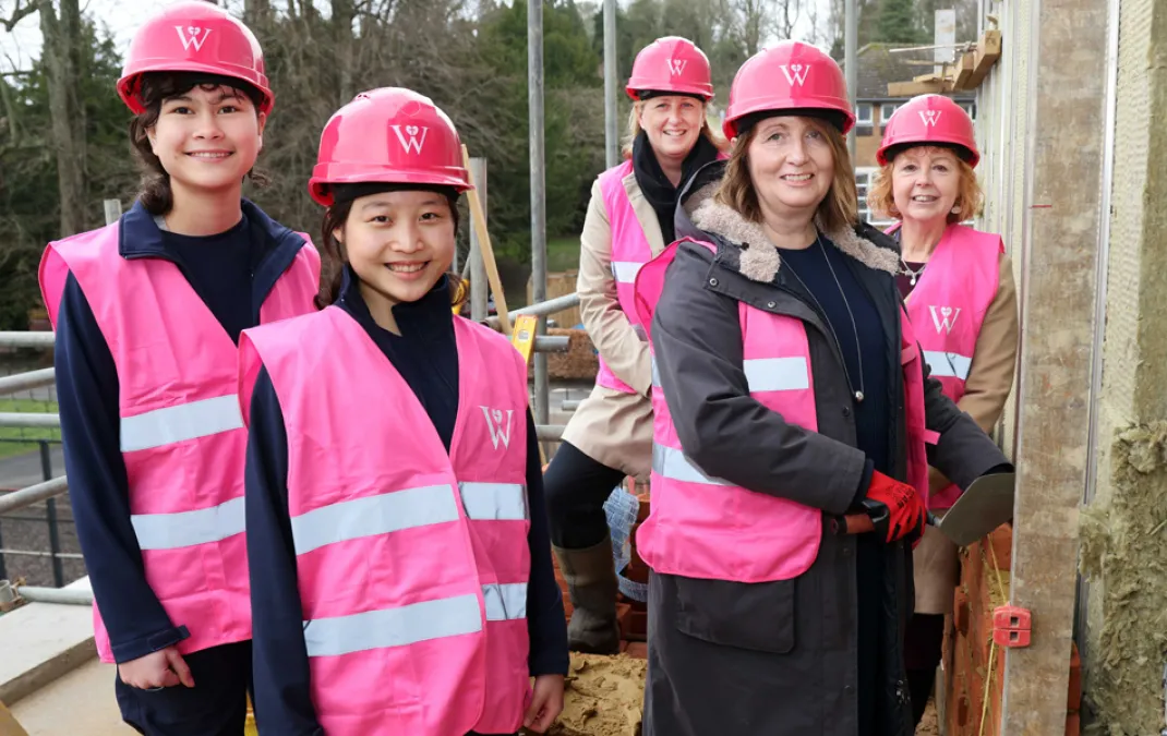‘Topping Out’ event celebrates half-way point for construction of Woldingham’s new Library and Sixth Form Centre