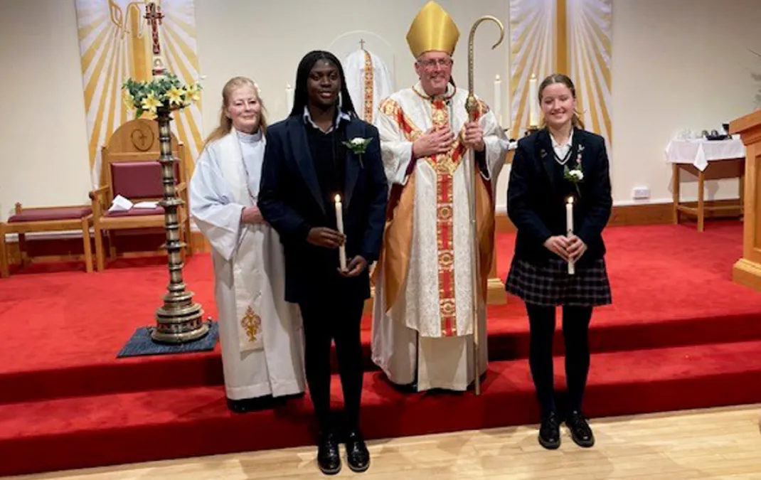 Anglican Bishop of Southwark confirms Mosope and Gabriella at Woldingham
