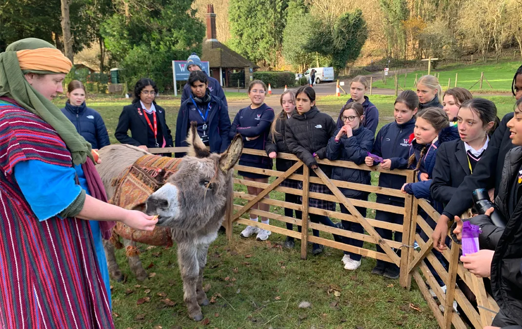 Year 7 and pupils from local schools reflect on the meaning of Christmas with the Wintershall Travelling Crib